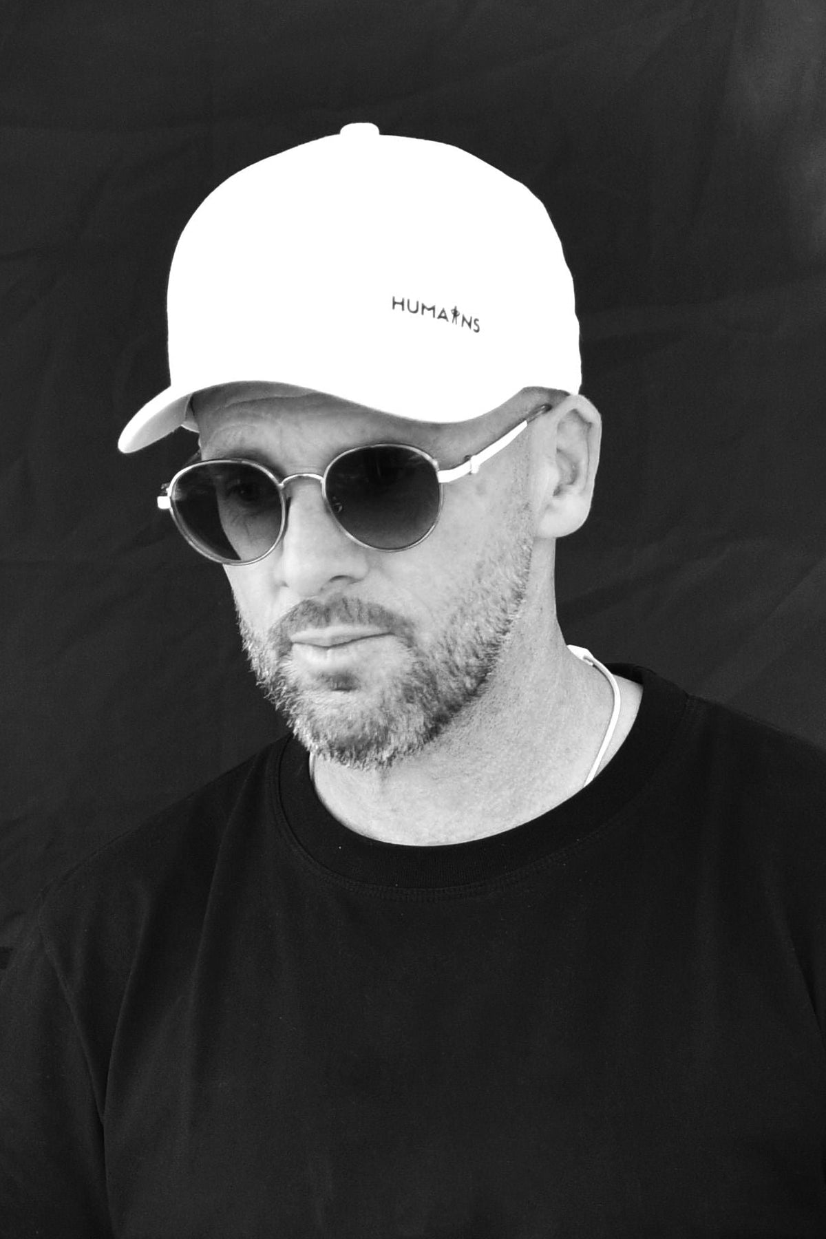 Casquette « Reste / Humains » – Blanche