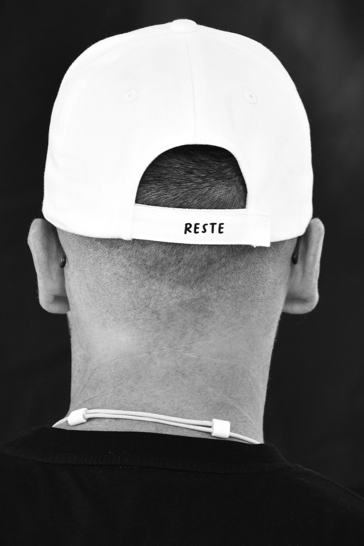 Casquette « Reste / Humains » – Blanche