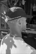 Casquette runner « On marche sur la tête » – Noire
